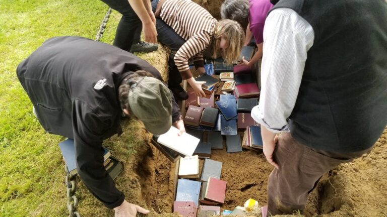 people burying books