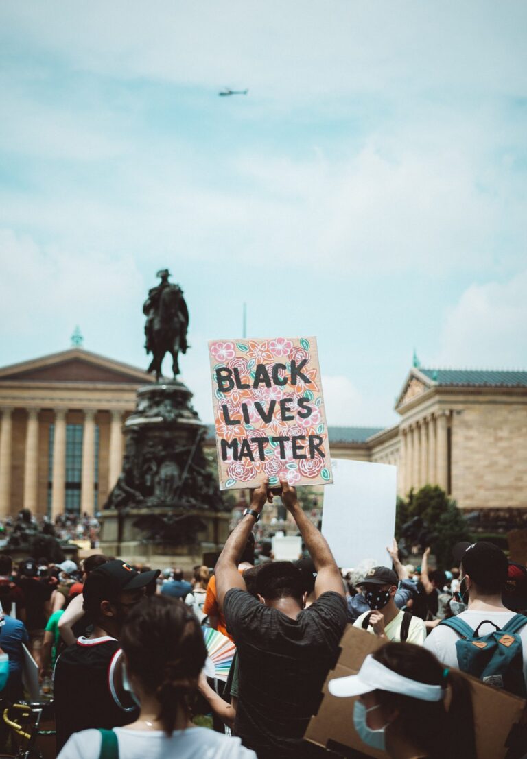 protest with Black Lives Matter sign raised