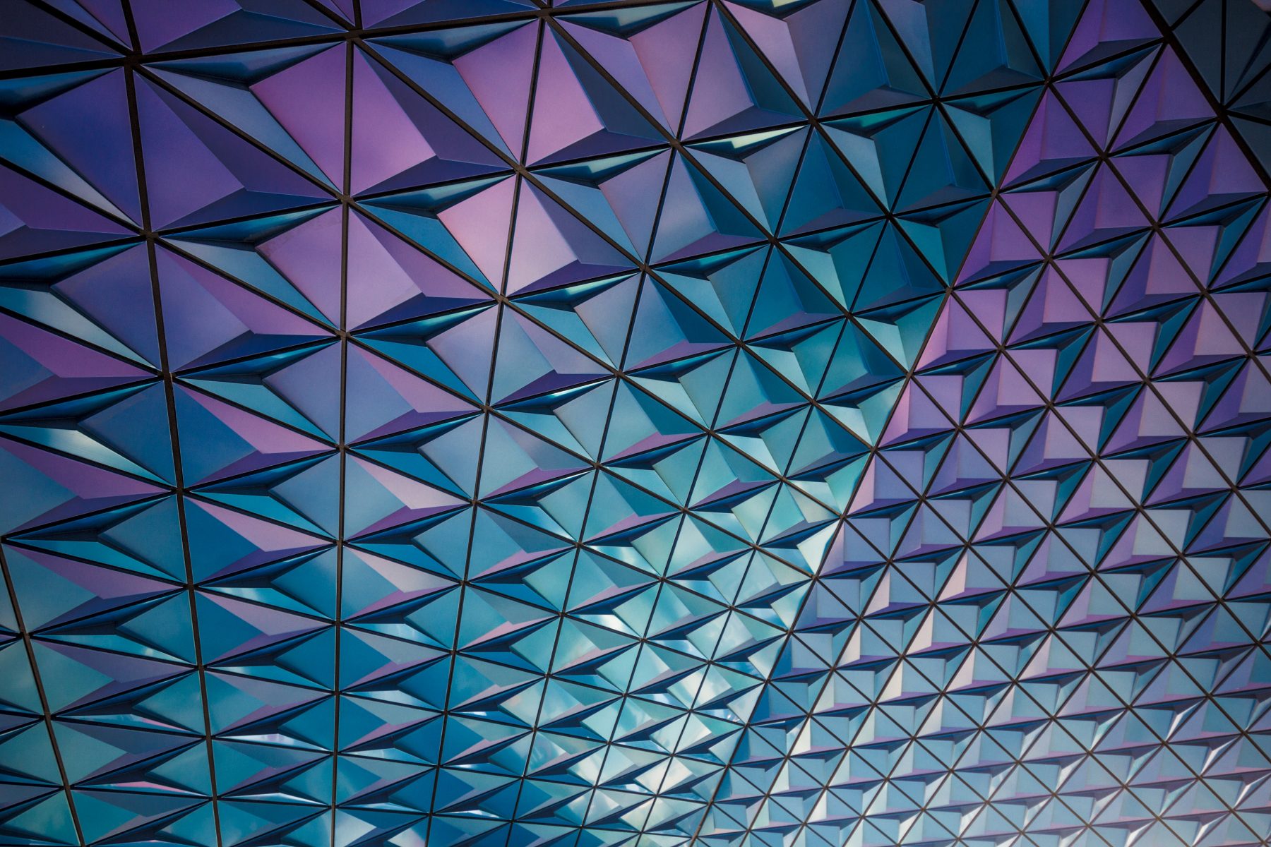 iridescent purple and teal geometric pattern