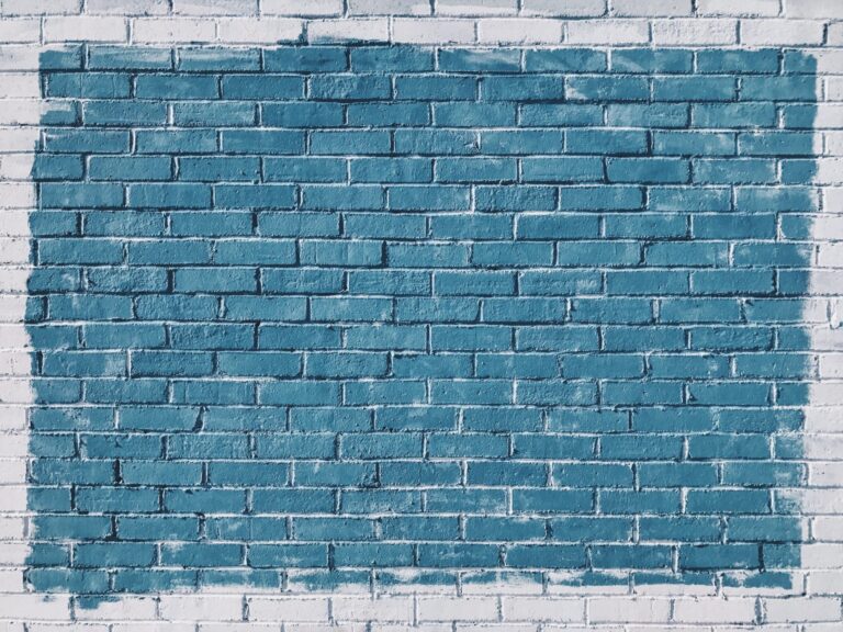 painted brick wall - large light blue rectangle surrounded in white