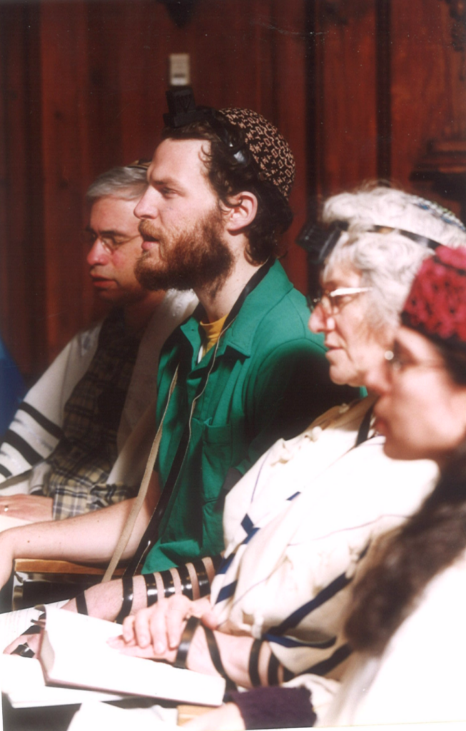 4 people in talitot and tefillin