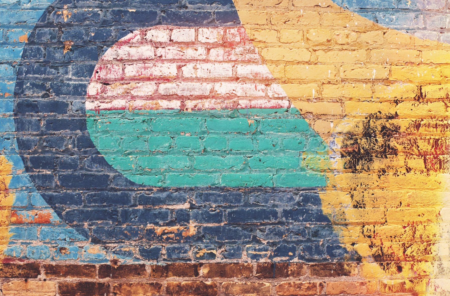 colorful mural on brick wall