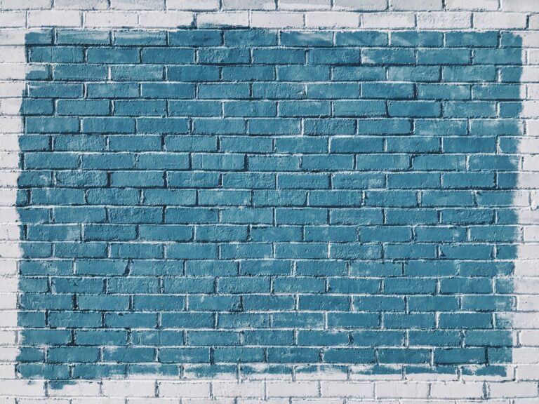 Blue brick wall with a white border.