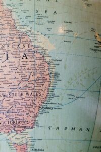 Close-up of a map showing eastern Australia, including Sydney, Melbourne, Brisbane, and the Coral Sea.