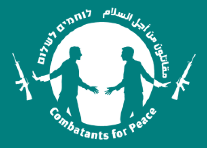 Silhouettes of two people with open arms, flanked by rifles, and text Combatants for Peace.