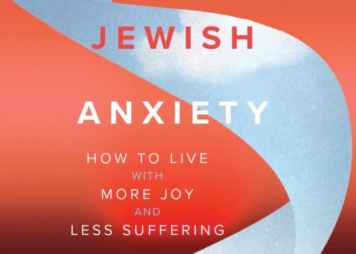 Book cover of Unlearning Jewish Anxiety by Caryn Aviv, with abstract blue and red background.