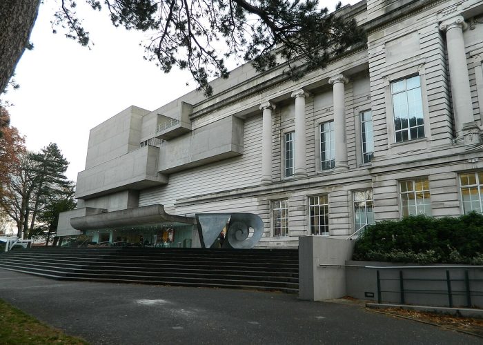 Exterior of a modern art museum with classical columns and contemporary geometric additions.