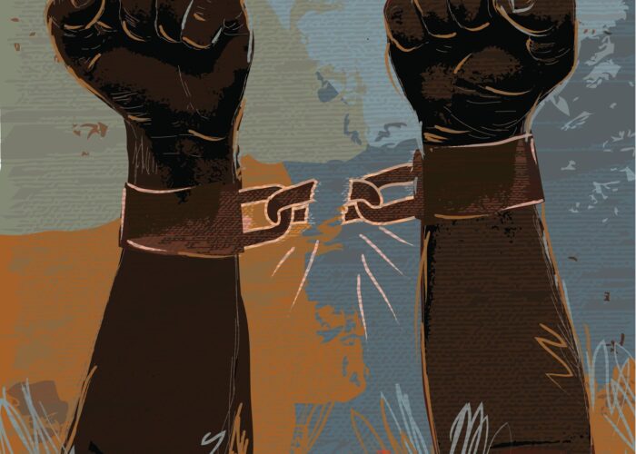 Illustration of two raised arms with broken shackles, symbolizing freedom and liberation.