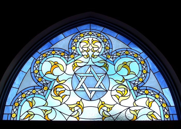 stained glass with Star of David at center
