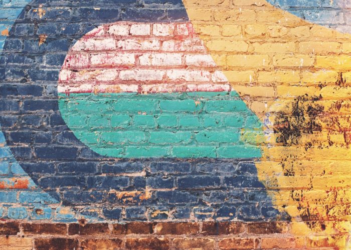 colorful mural on brick wall